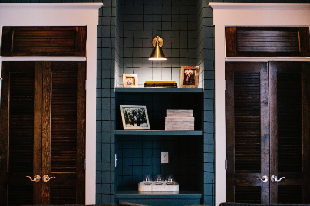 green plaid wallpaper in den man cave cigar room design