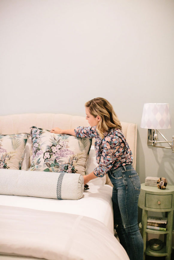 lindsey cheek of gathered interior design fluffing pillows